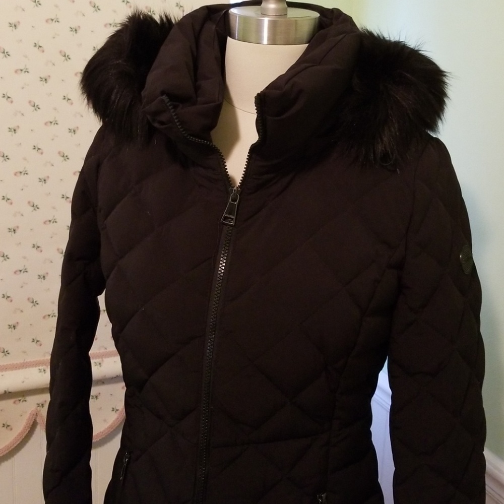 Puffy knee length jacket with detachable hood